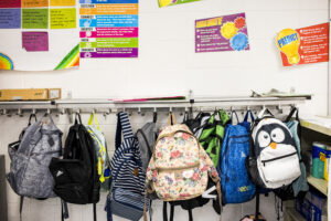 A colorful array of student backpacks.